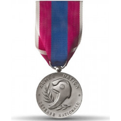 Médaille ordonnance défense nationale représentant un bonnet phrygien
